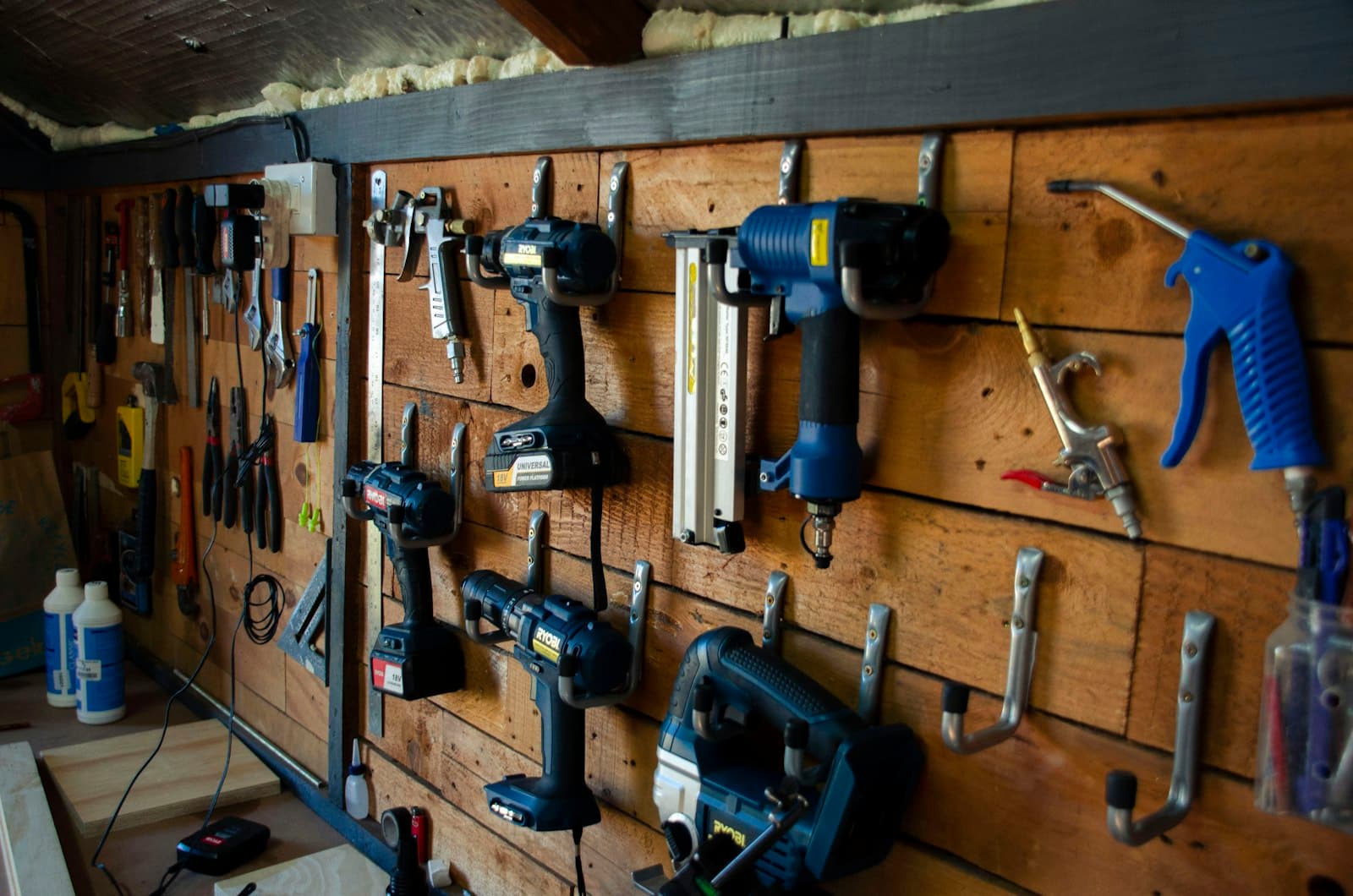 Workshop detail — tools laid out before a framing day