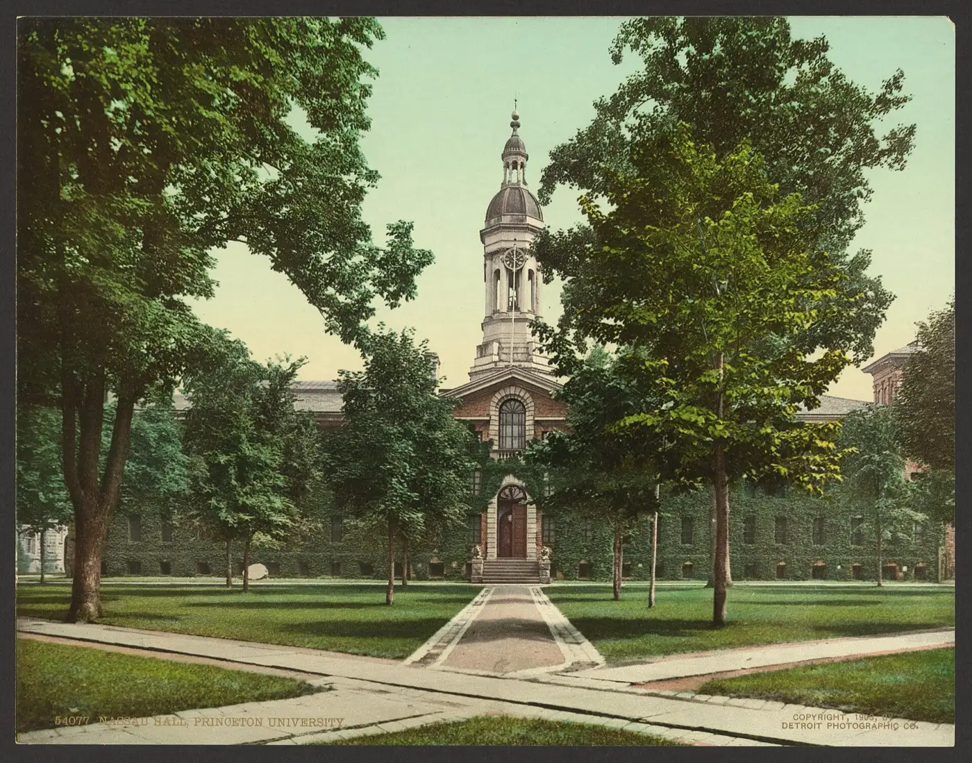 Nassau Hall at Princeton University in 1903: the ivy-covered stone hall with its central cupola, seen across the lawn and front walk