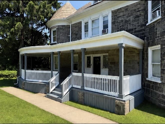 Alternate porch angle from a completed deck and exterior project by The5thwall