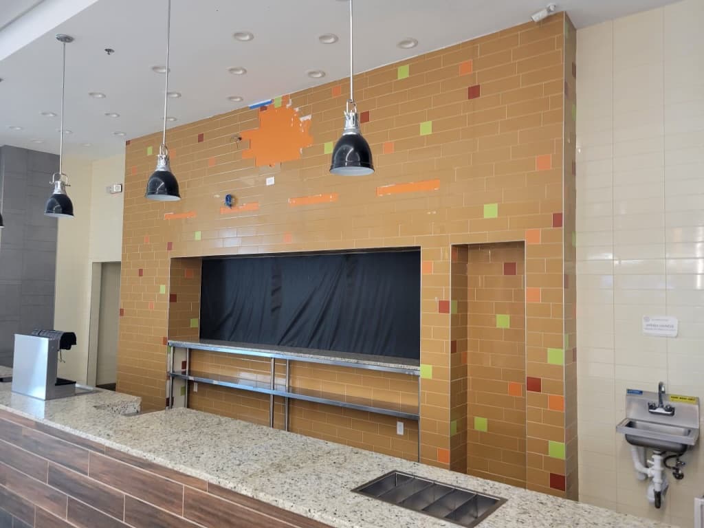Meatheadz commercial kitchen — existing tile wall wide view